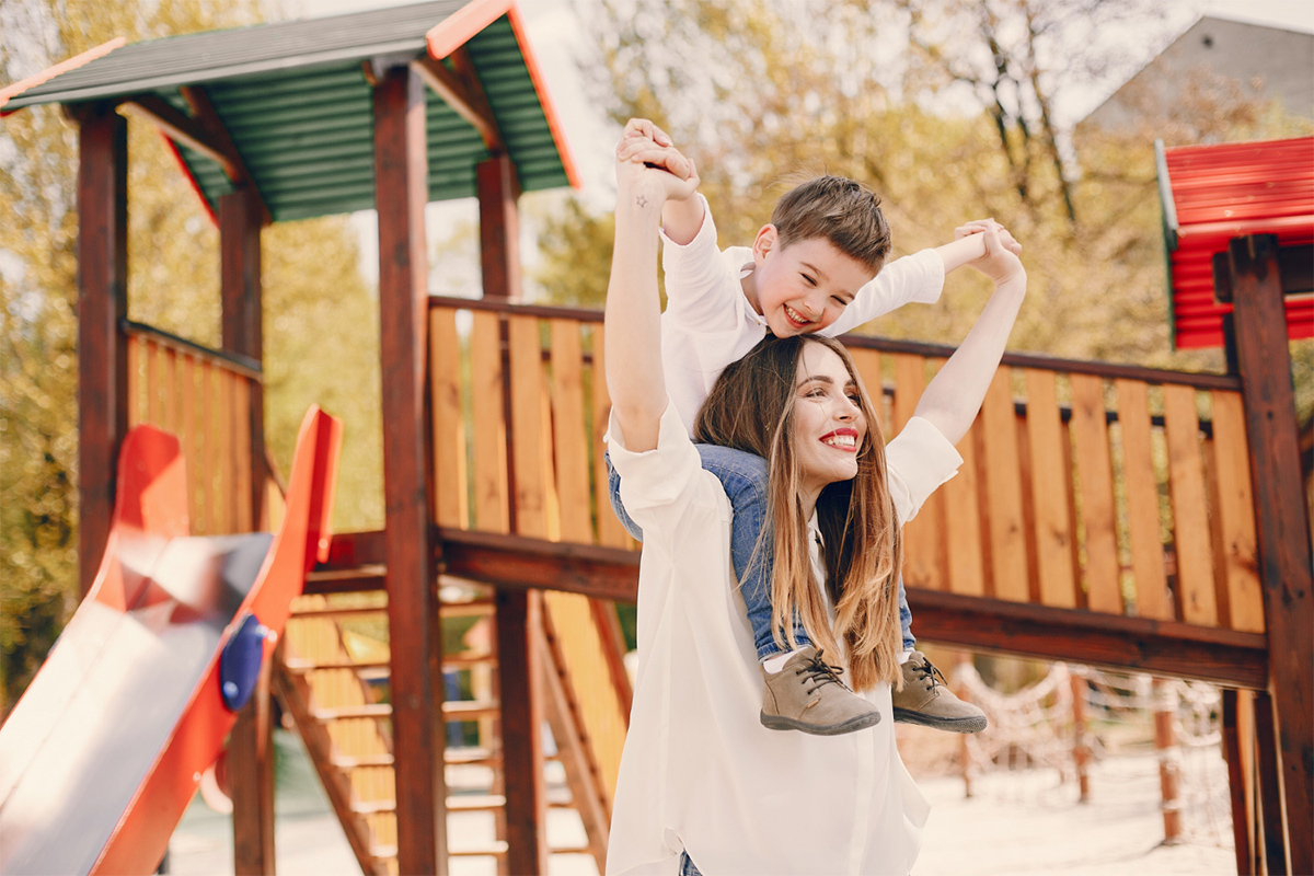 freepik_mother_son_playground